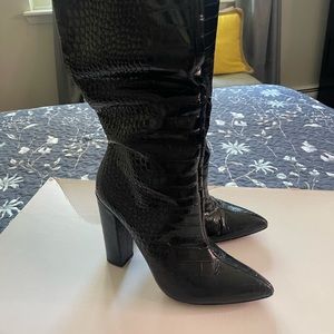 beautiful lightly used black leather knee boots in excellent condition